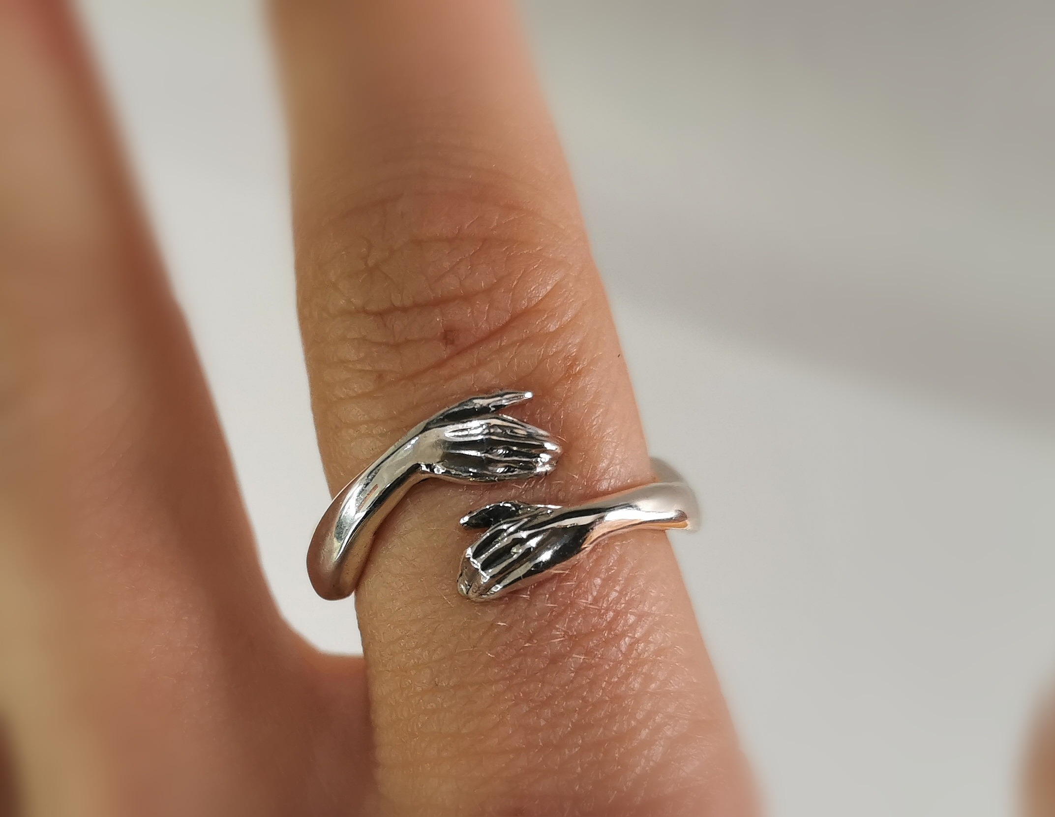 Hug ring adult hands